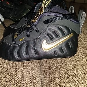 black and gold infant foamposites